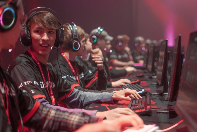 Highschool kids engaged in an esports tournament