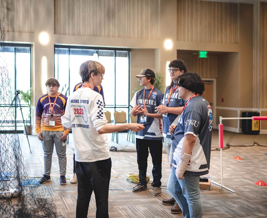 Fenworks staff assisting drone racing teams